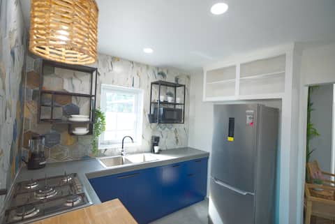 Modern kitchen with cobalt blue cabinetry