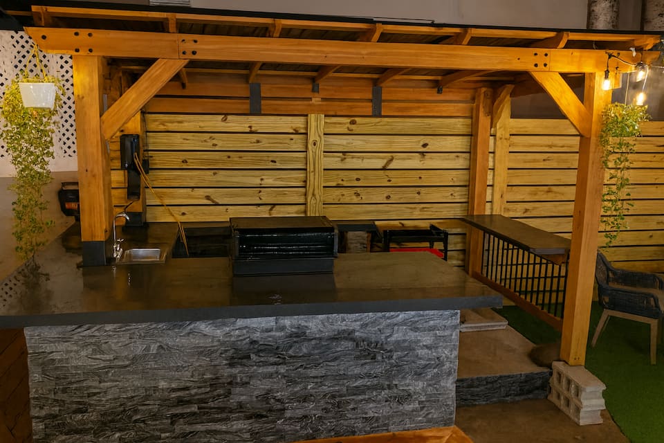 Outdoor bar and grill pergola